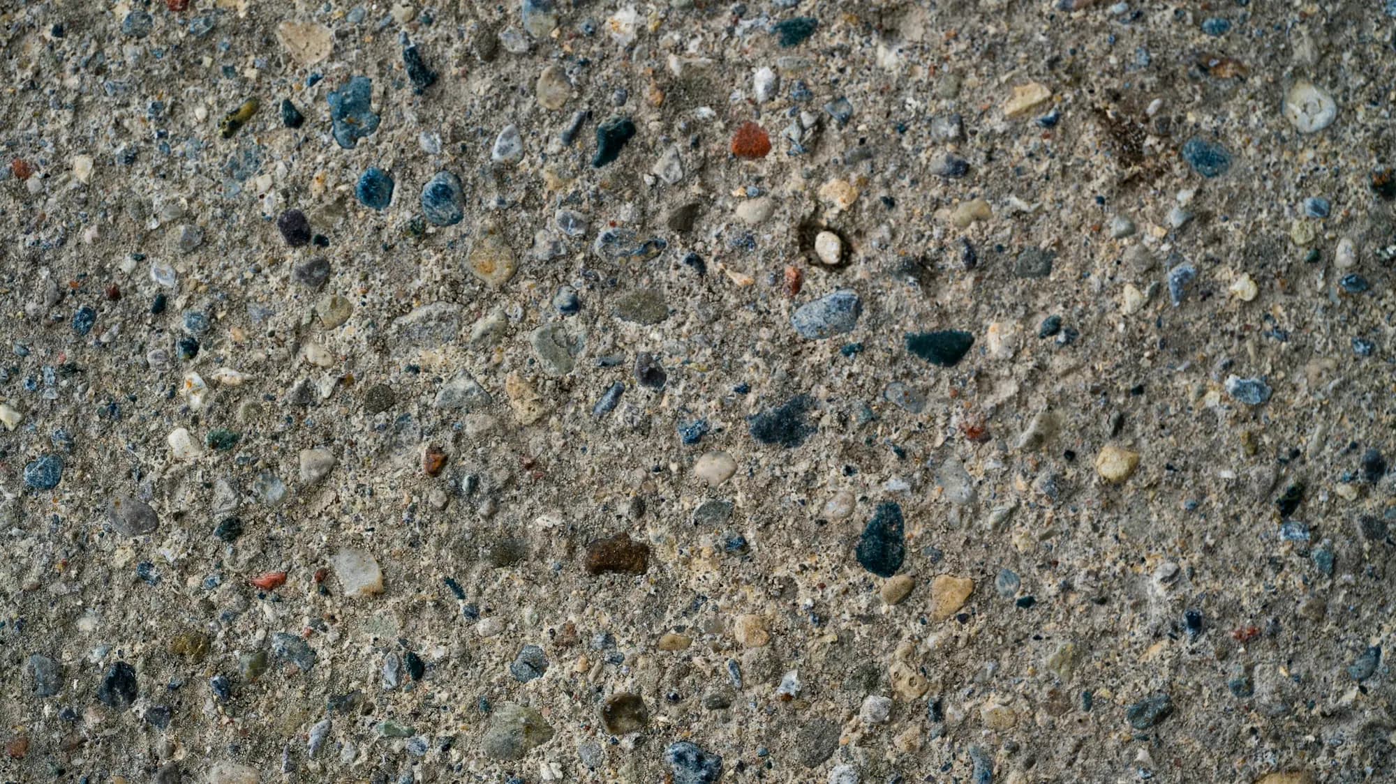 Honed aggregate and exposed aggregate concrete side by side
