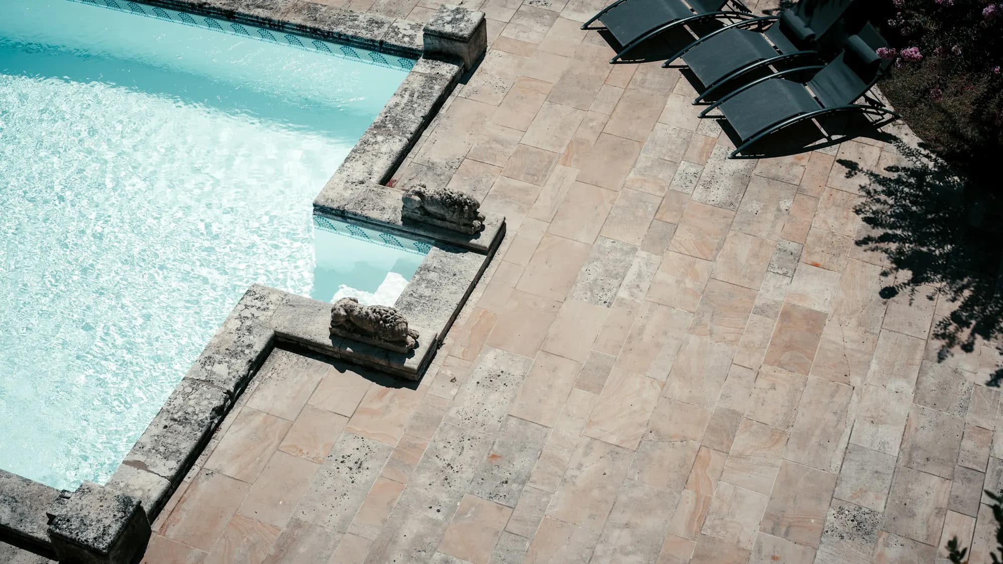 Liquid limestone finish around a pool